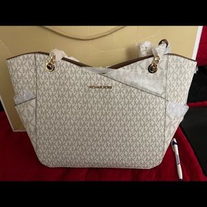 Michael Kors purse brand new still in package